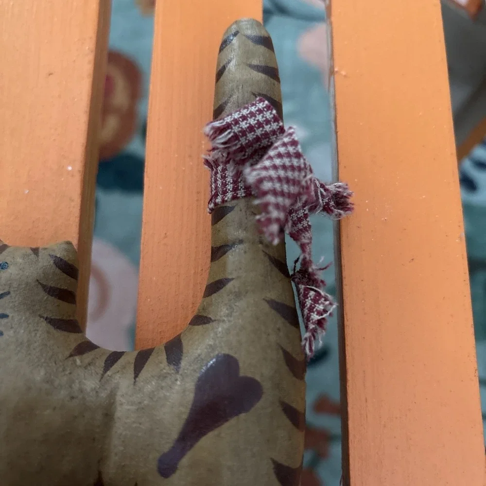 Folk Art Brown Cat Toy on Blue Wheels with Bow On Tail